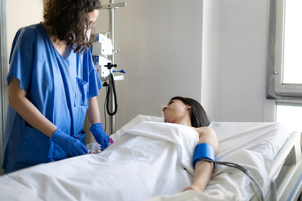 nurse injecting saline solution to hospitalized pa 2025 04 17 19 03 45 utc